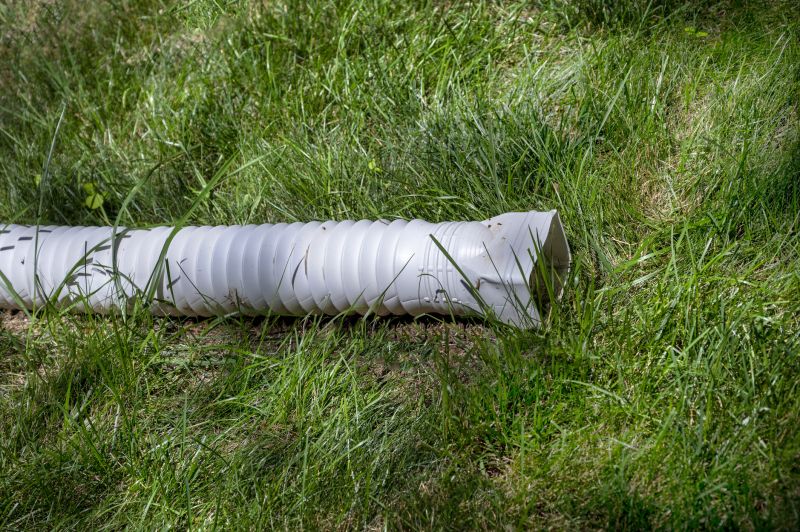 Downspout extension directing water away